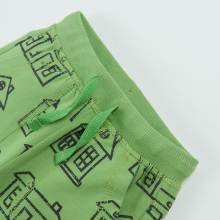                             Sportovní kalhoty s motivem domů- zelené                        