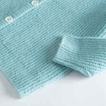                             Pletený zapínací svetr- mátový                        