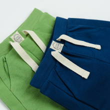                             Sportovní kalhoty 2 ks- modrá, zelená                        