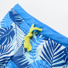                             Plavecké šortky s potiskem tropických listů- modré                        