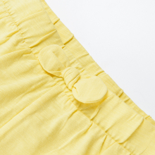                             Šortky s elastickým pasem a mašlí- žluté                        
