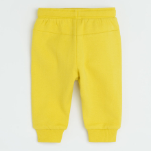                             Sportovní kalhoty s aplikací- žluté                        