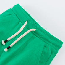                             Sportovní kalhoty s aplikací- zelené                        