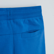                             Sportovní kalhoty s aplikací na kolenou- modré                        