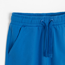                             Jednobarevné teplákové kalhoty -modré                        