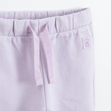                             Jednobarevné teplákové kalhoty -světle fialové                        