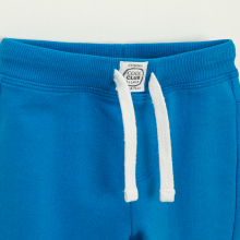                             Jednobarevné tepláková kalhoty -modré                        